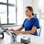 Veterinarian using digital tools powered by VitalUp’s data analytics