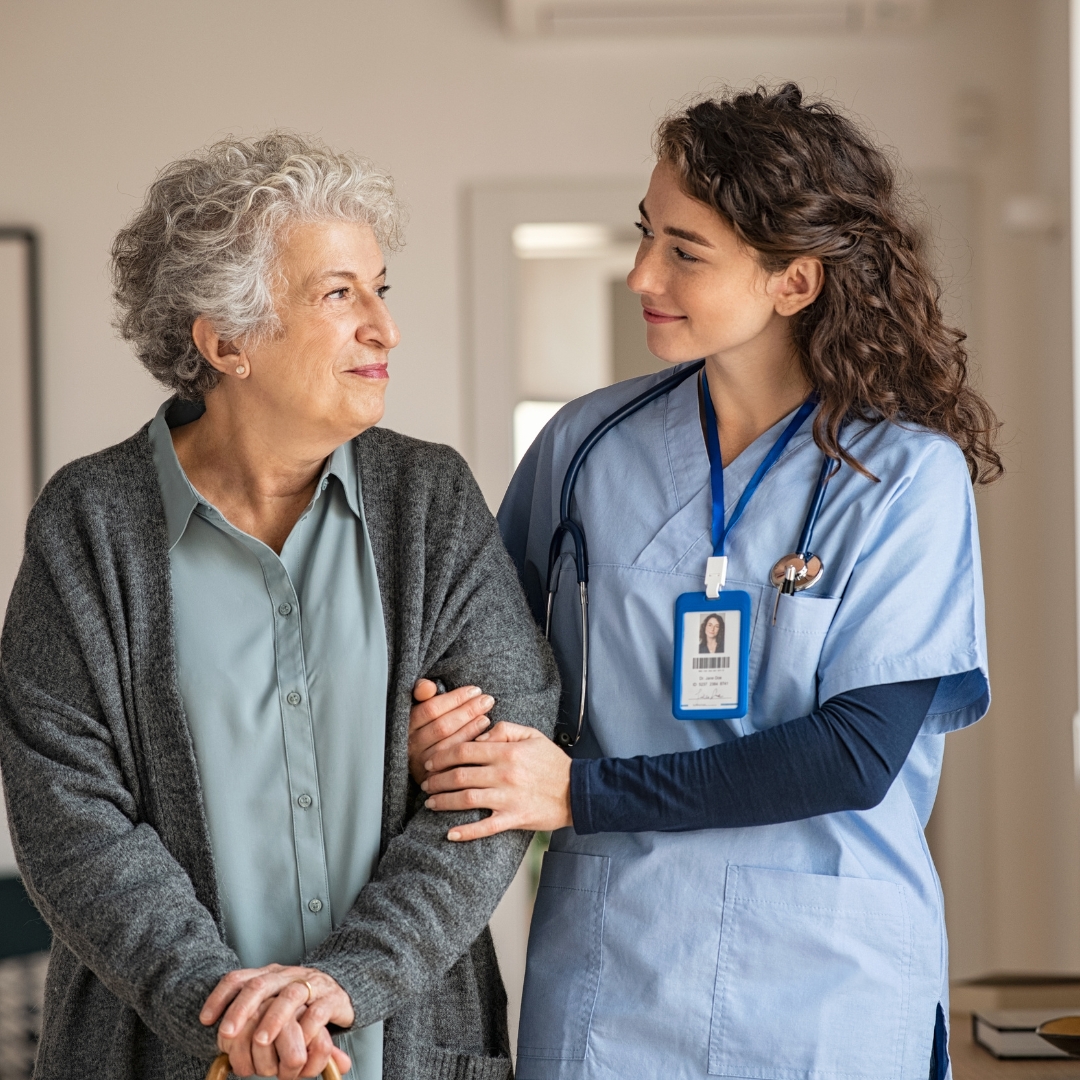 Senior receiving assistance in a comfortable community setting