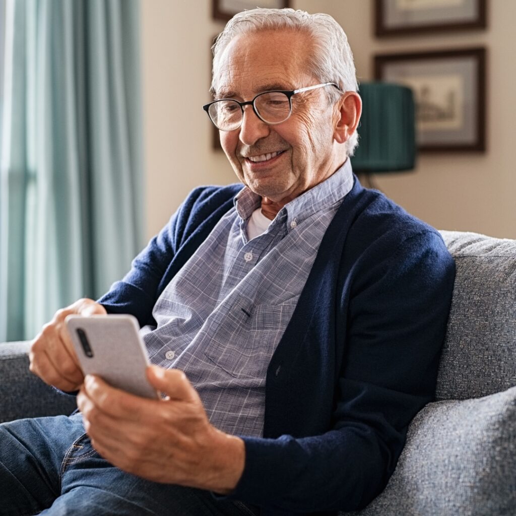 Person browsing assisted living website on a smartphone