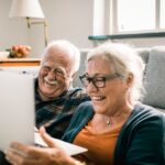 Retirement community with friends playing cards and warm daily life