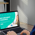 Dental website and logo colors creating a trustworthy, welcoming first impression for patients.