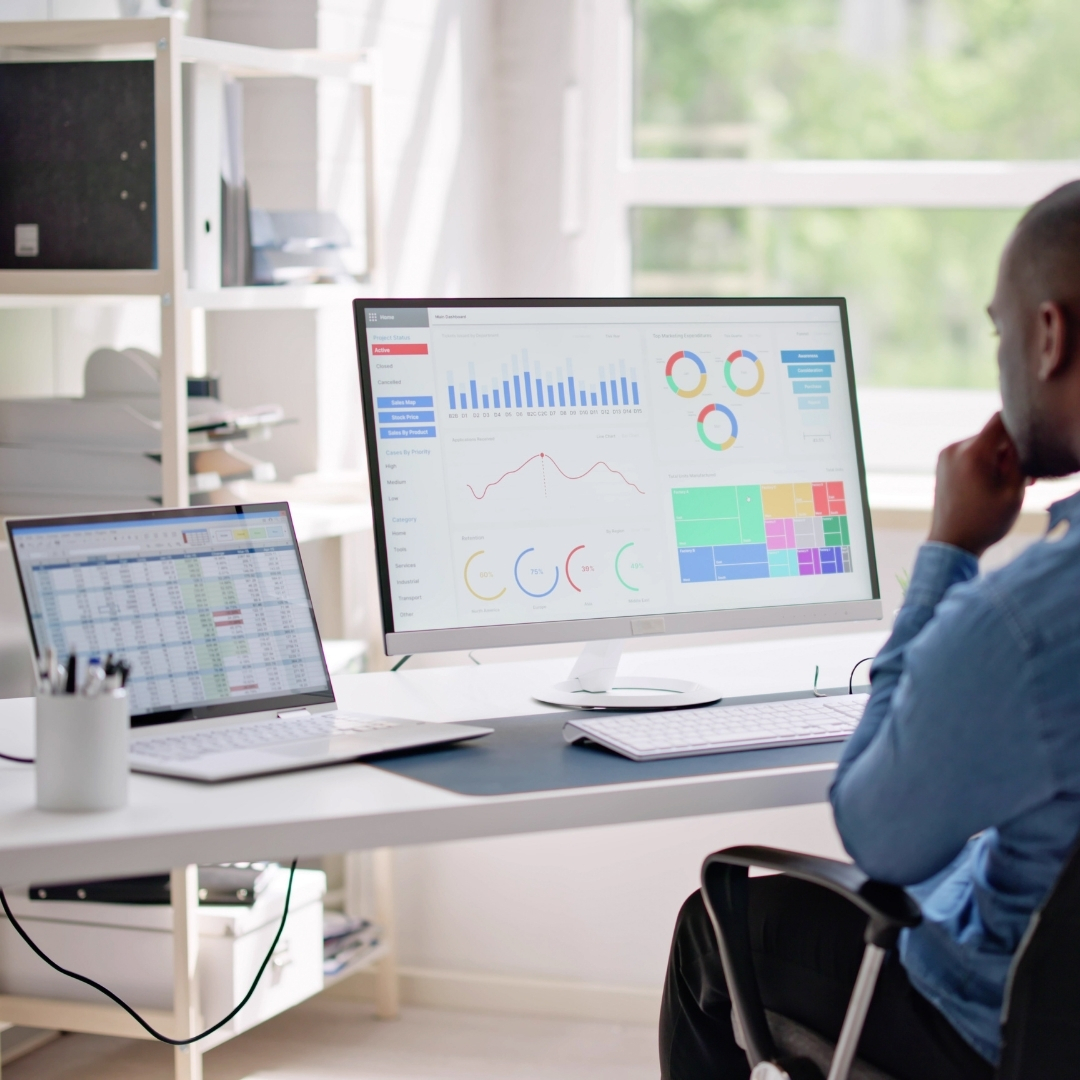 Marketer reviewing senior living ad metrics on a dashboard.