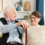 Family researching assisted living options on a senior care website