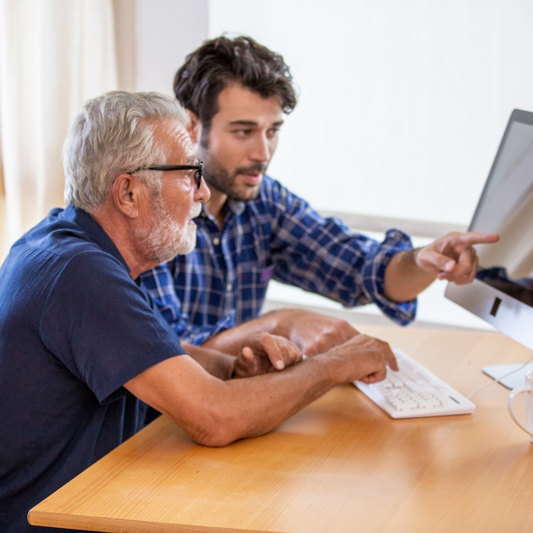 Family reviewing senior living information online